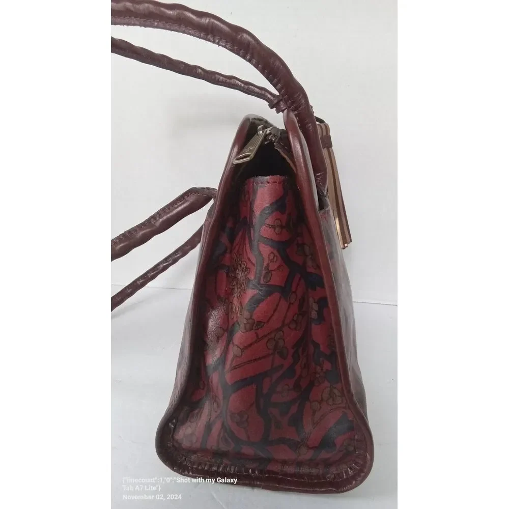 Vintage Tooled Leather Handbag with Tassel‎ Detail Brown Burgundy Floral Pattern